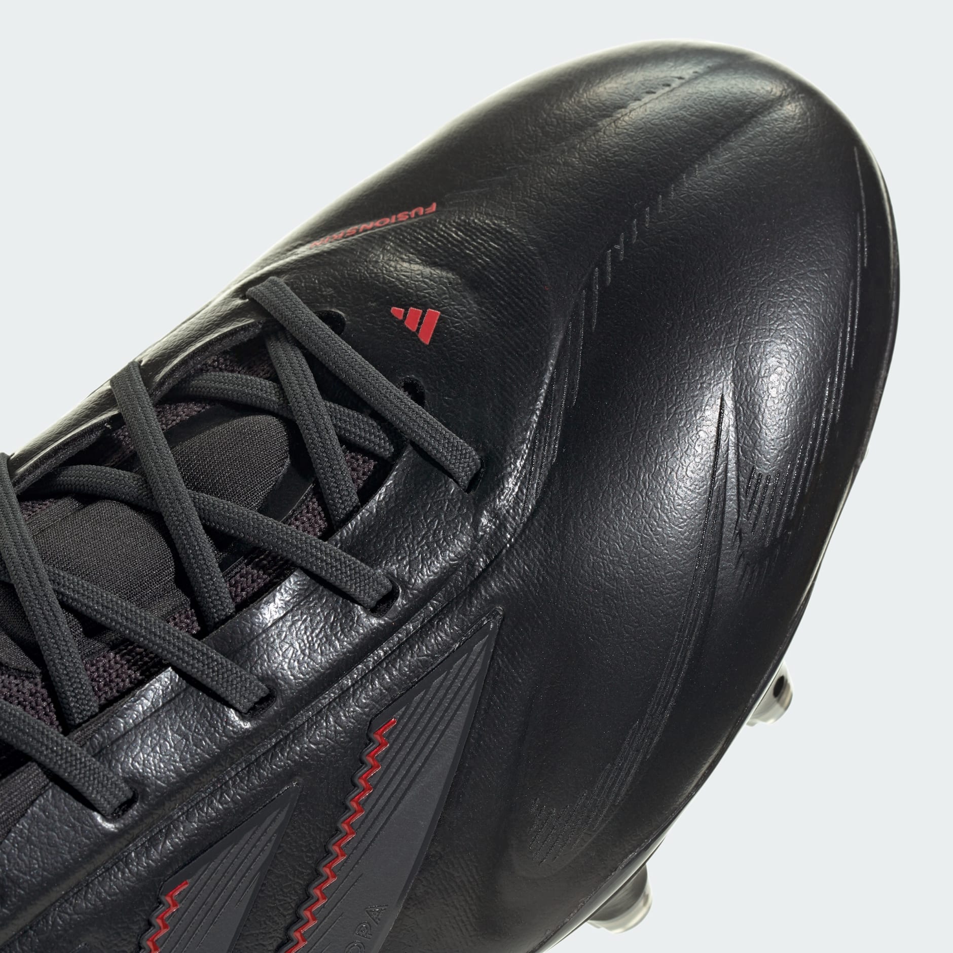 Ghete de fotbal Copa Pure 3 Elite pentru teren ferm