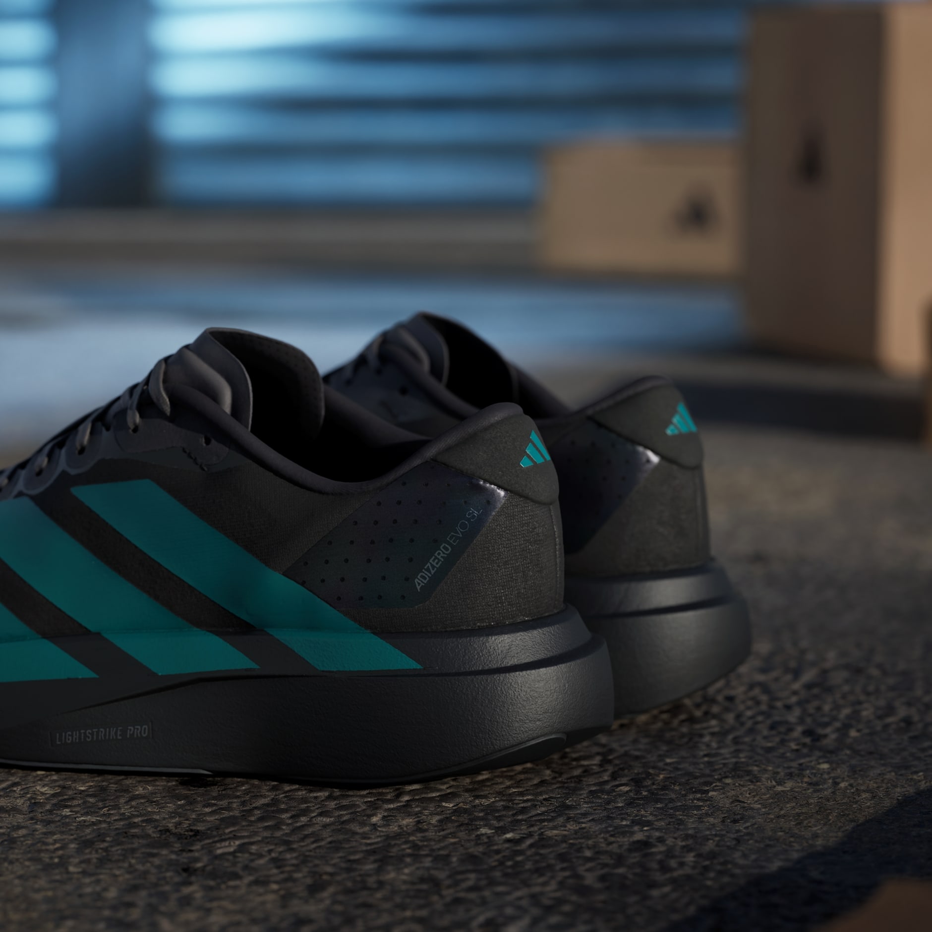 Shoes - Adizero EVO SL Shoes - Black | adidas Oman