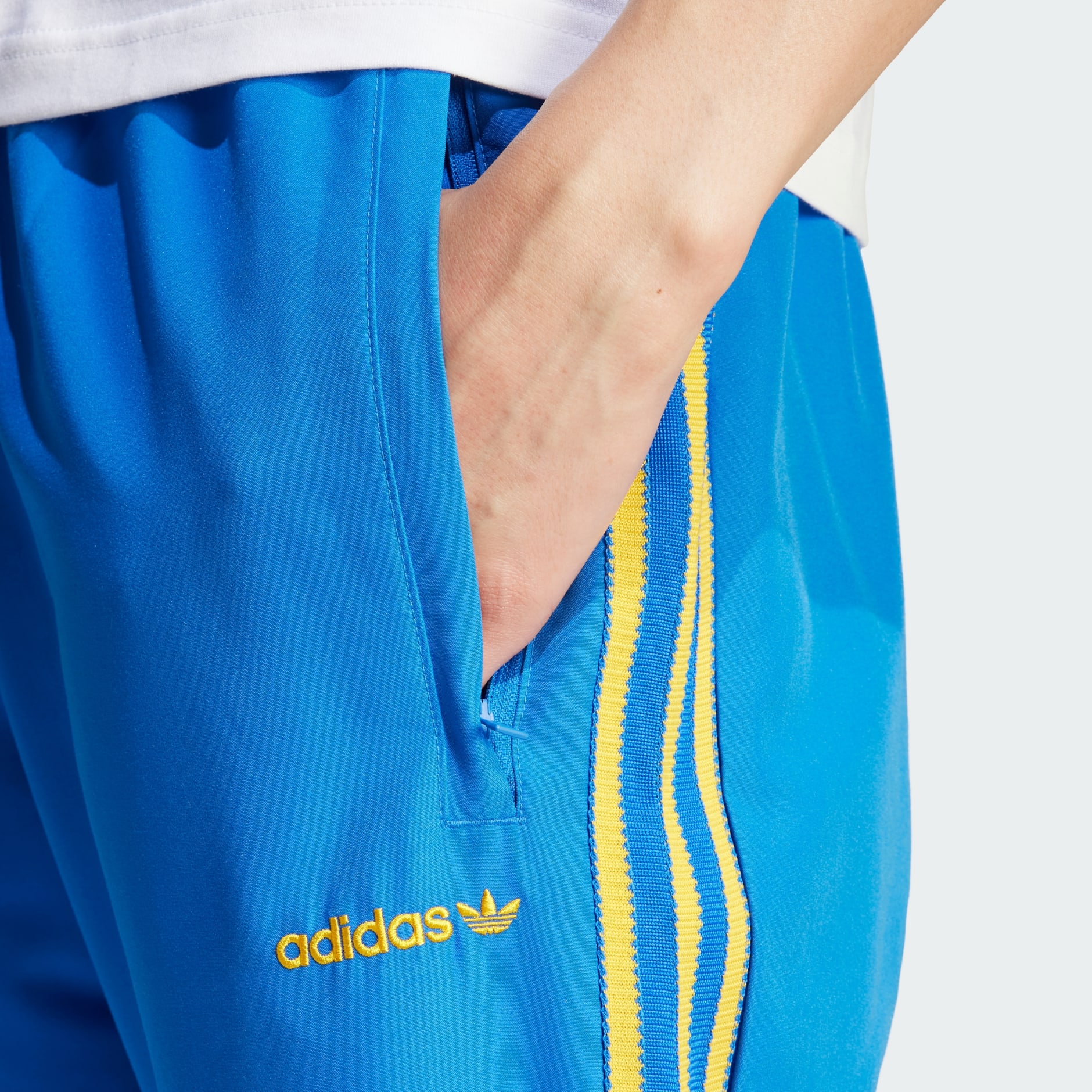 Men's adidas woven track pants hotsell