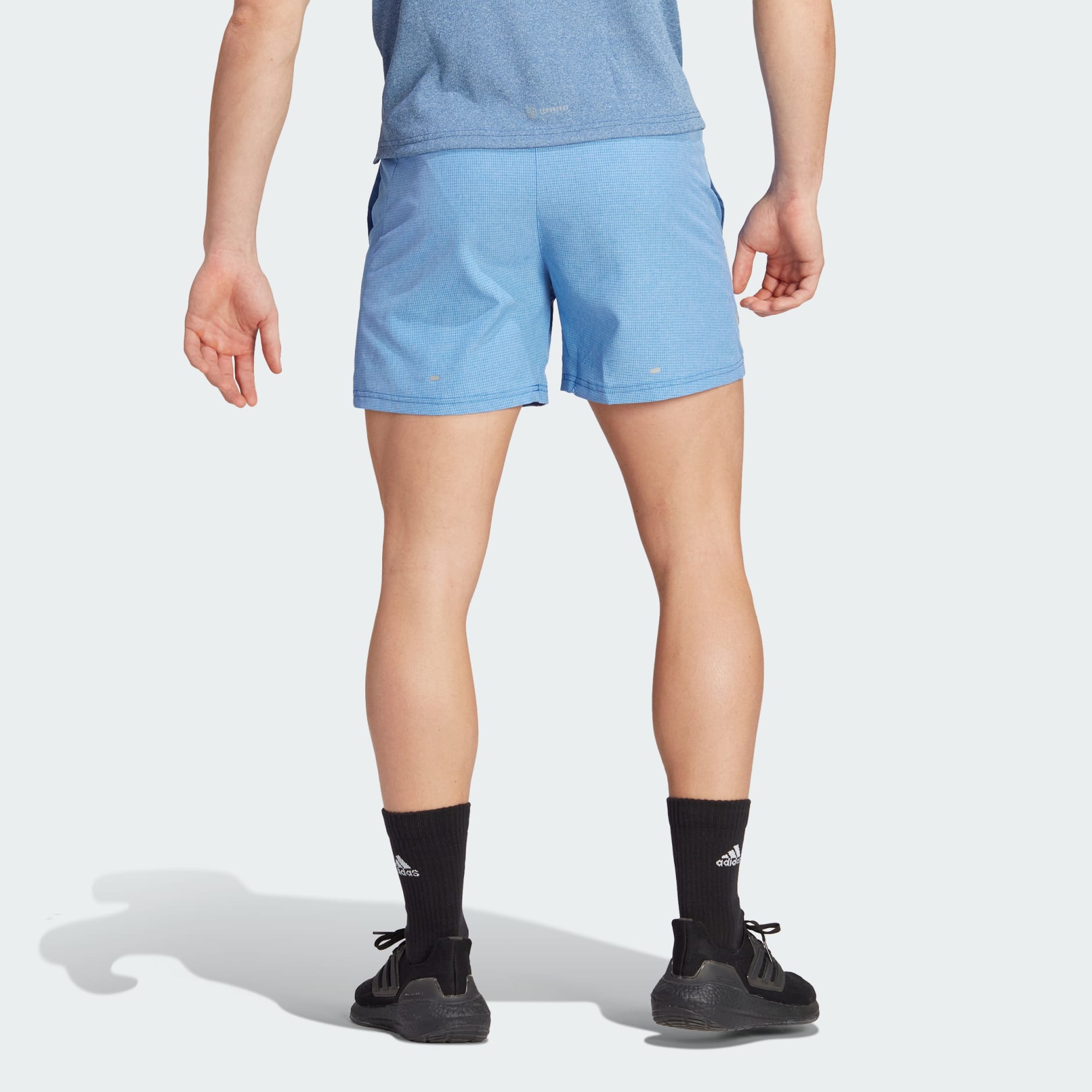 Men's Clothing - Own the Run Heather Shorts - Blue | adidas Egypt