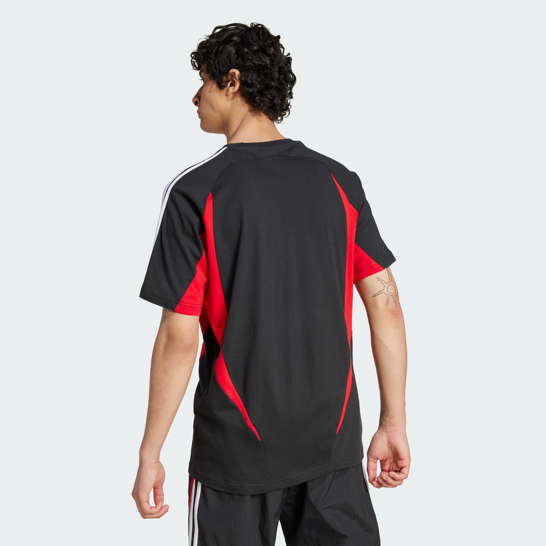 Adidas styling complements tee online