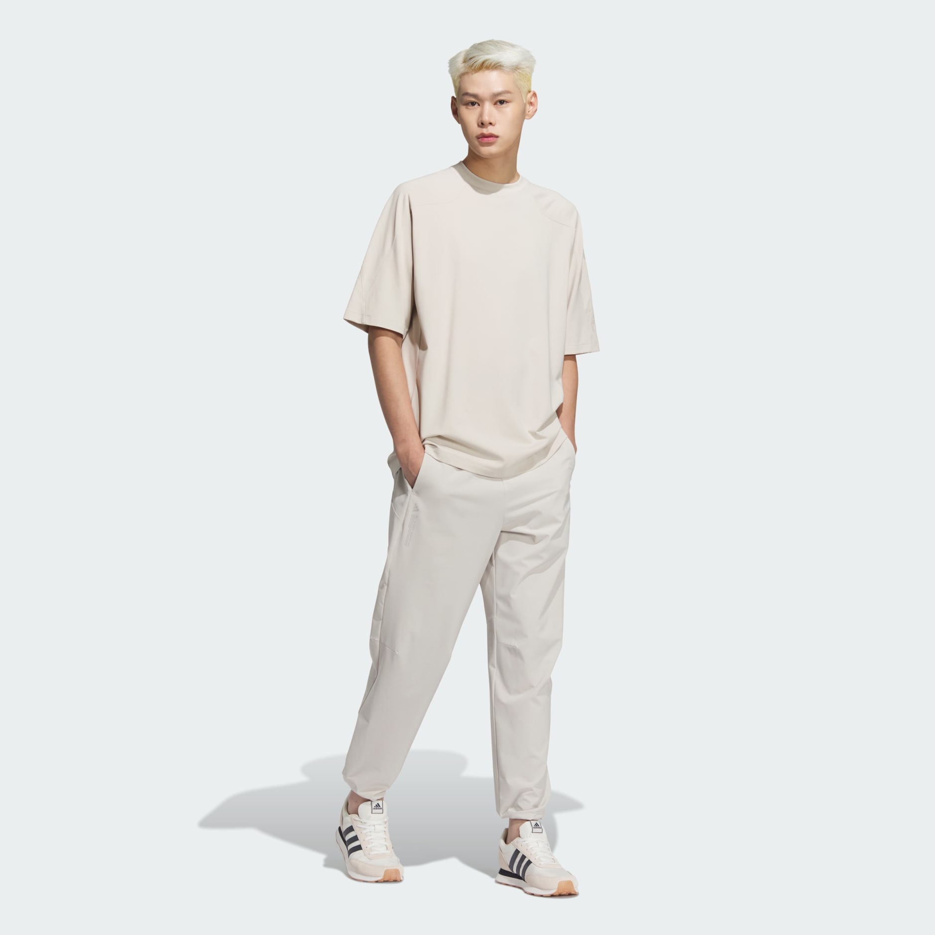 City Escape Lightweight Woven Pants - Beige | adidas Hong Kong