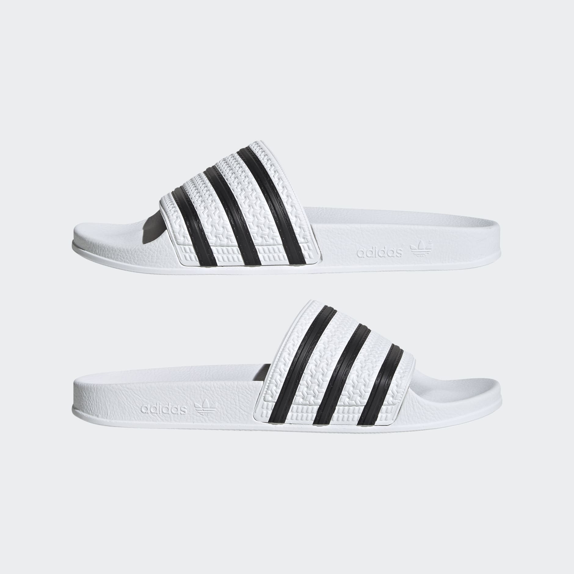 White and store black adidas slides