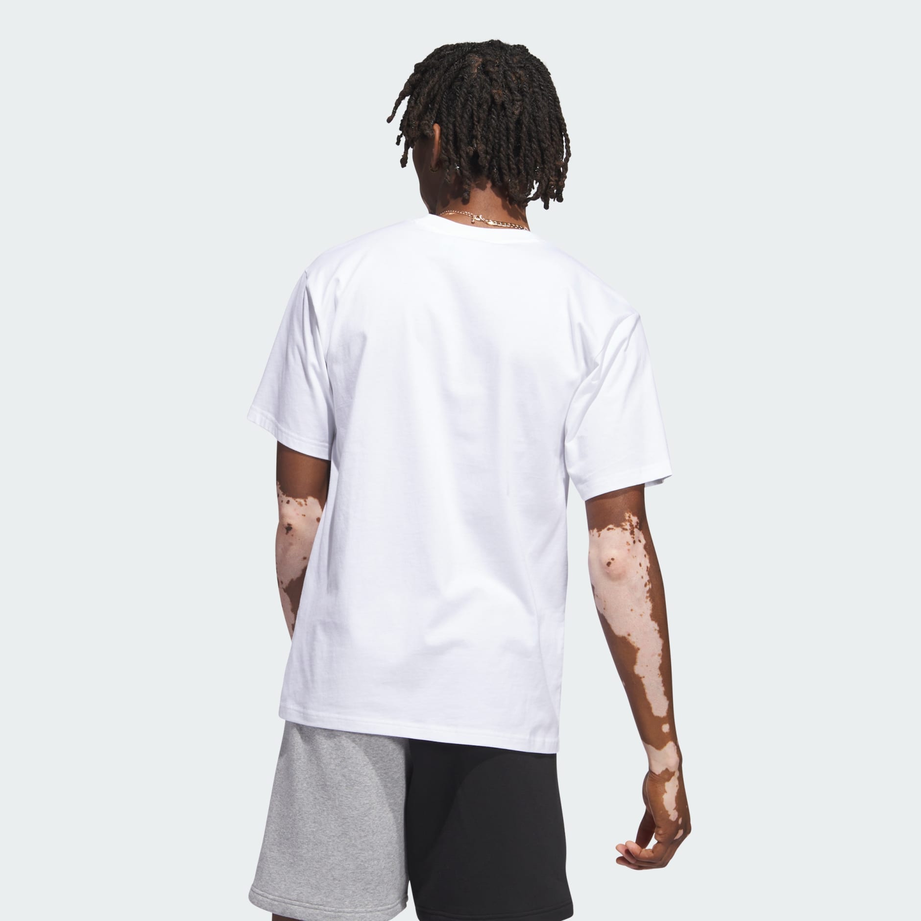 Adidas multi logo store tee