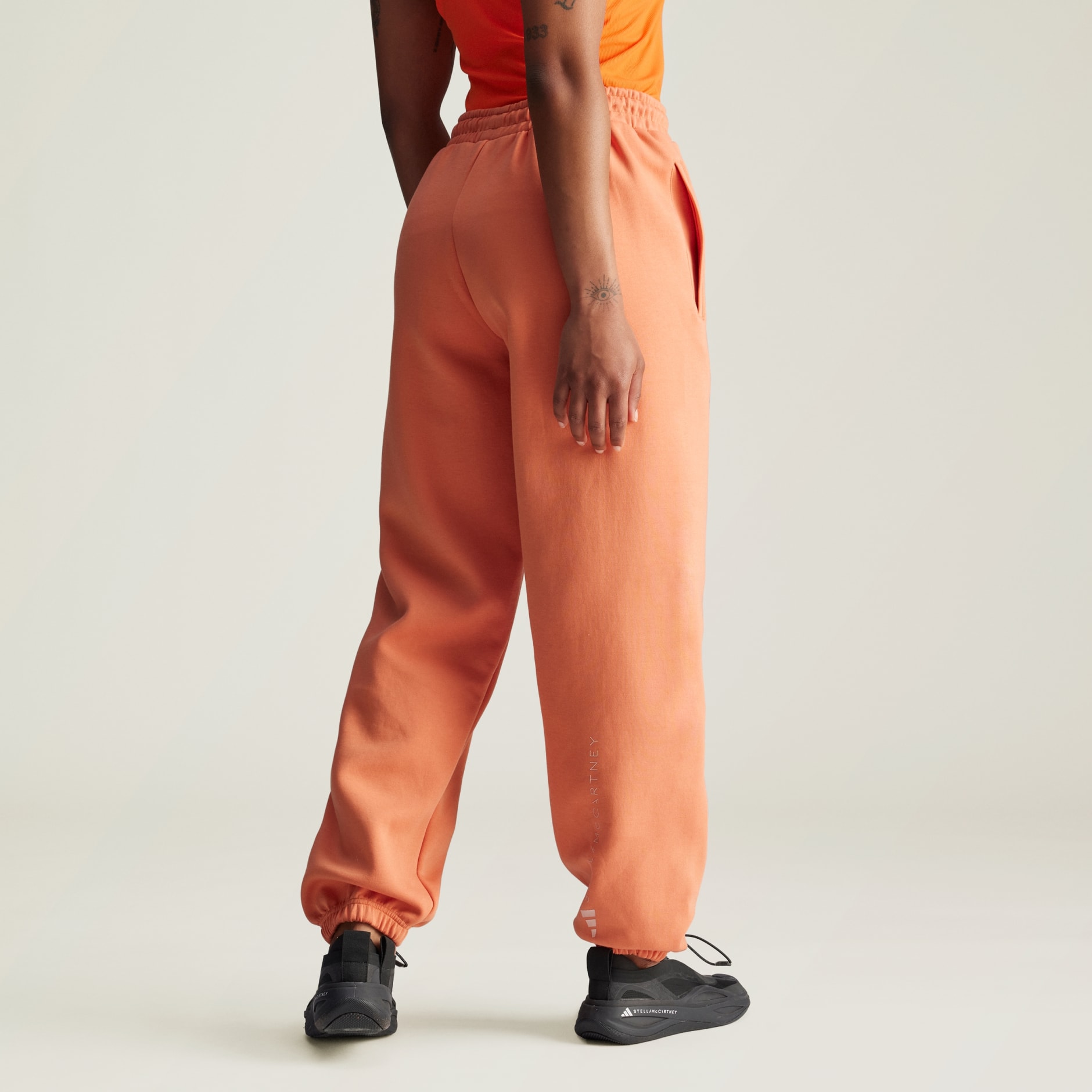 Women's Clothing - adidas by Stella McCartney Loose Sweat Pants - Orange |  adidas Saudi Arabia