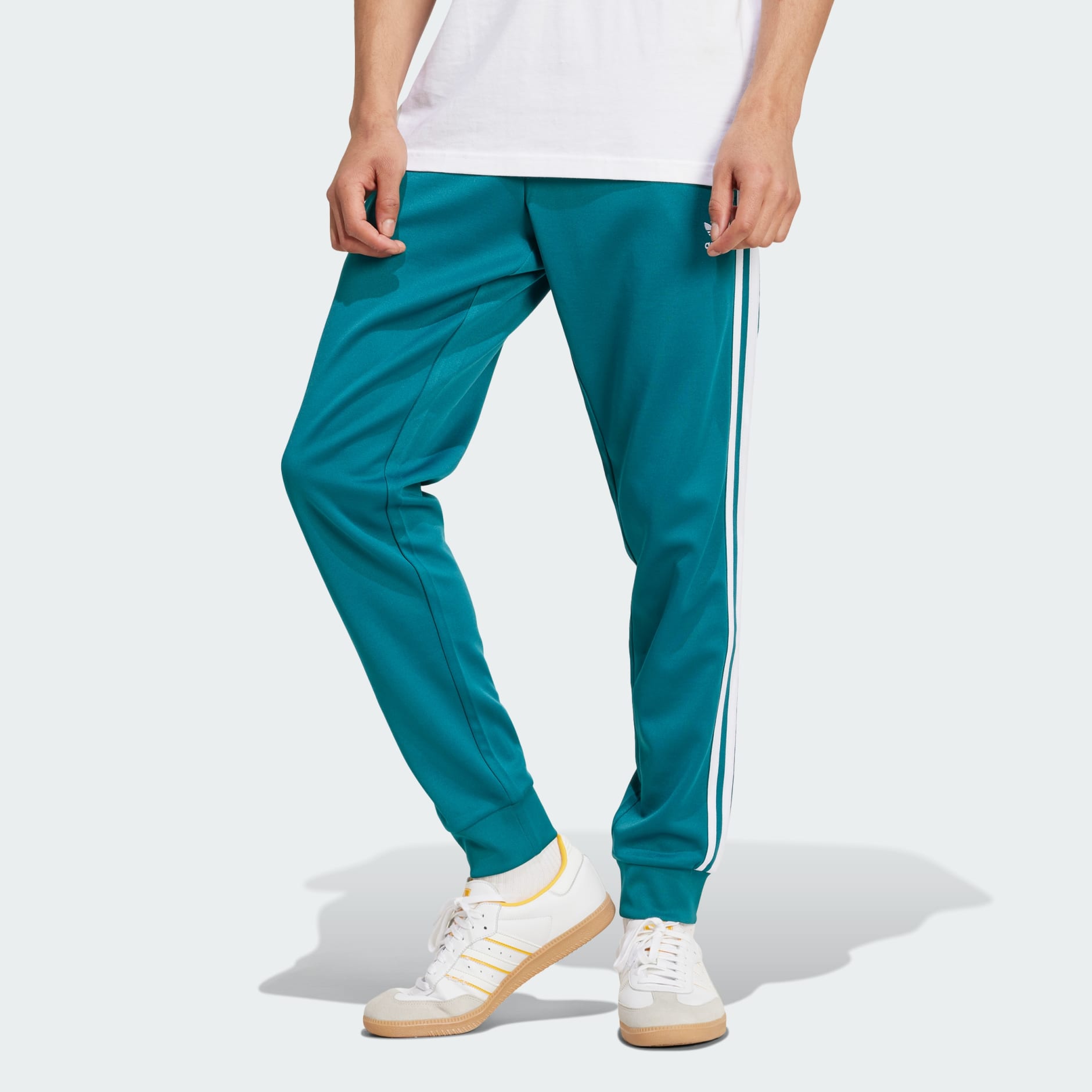 Adidas sst track pants noble green best sale