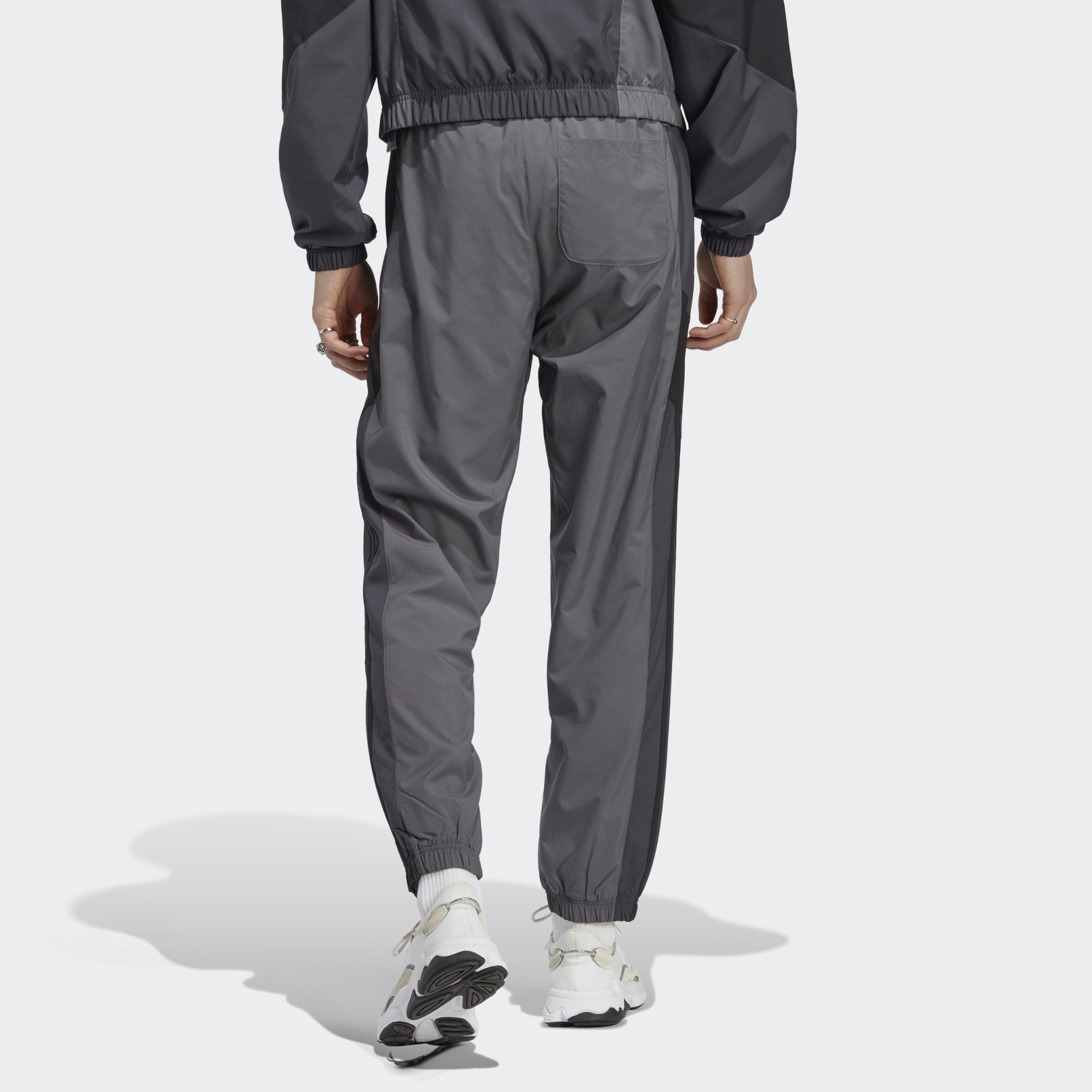Men's Clothing - adidas Rekive Woven Track Pants - Grey | adidas Kuwait