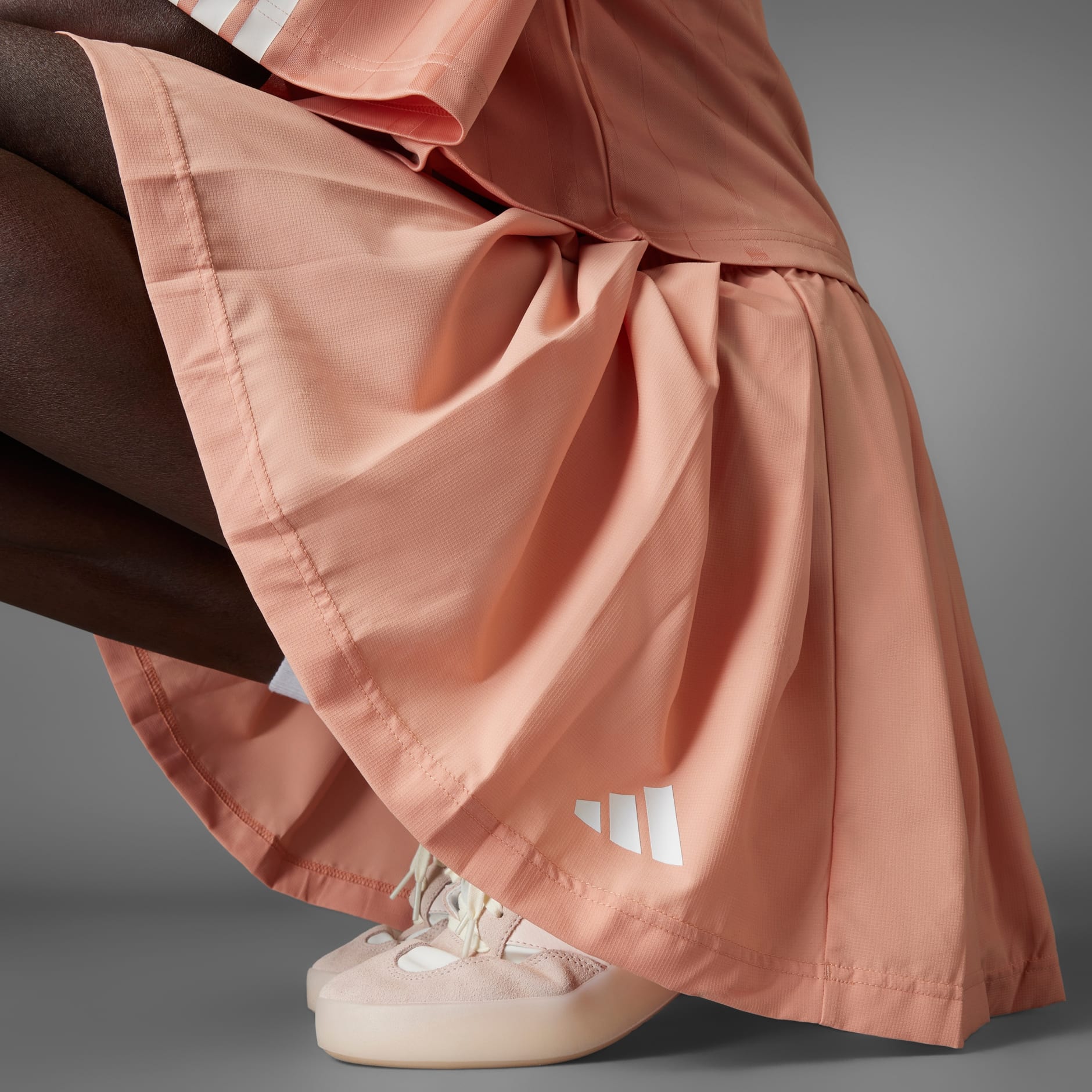 CLOTHING - Tiro Pleated Skirt - Pink | adidas Oman