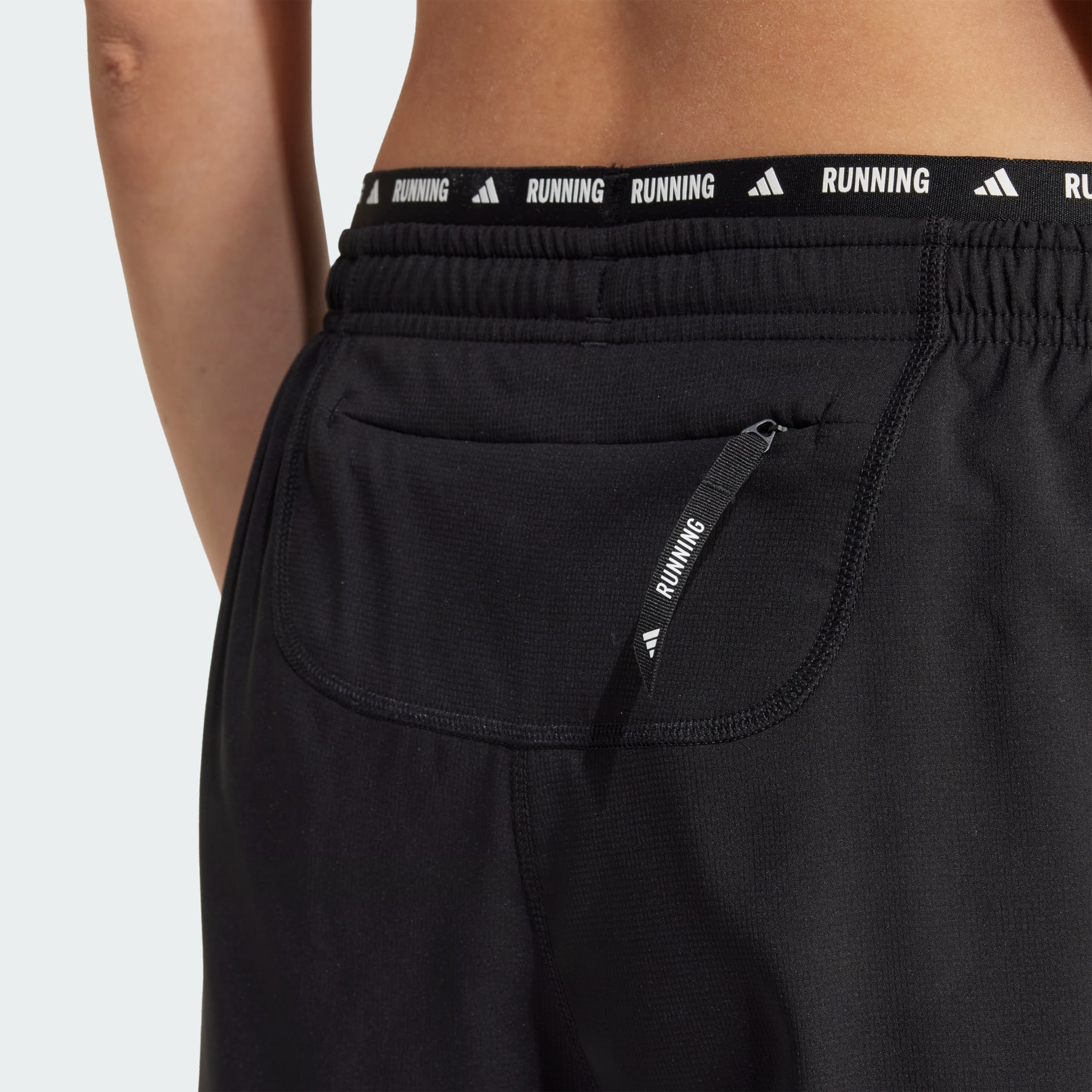 Pantaloni scurți Own the Run cu 3 dungi