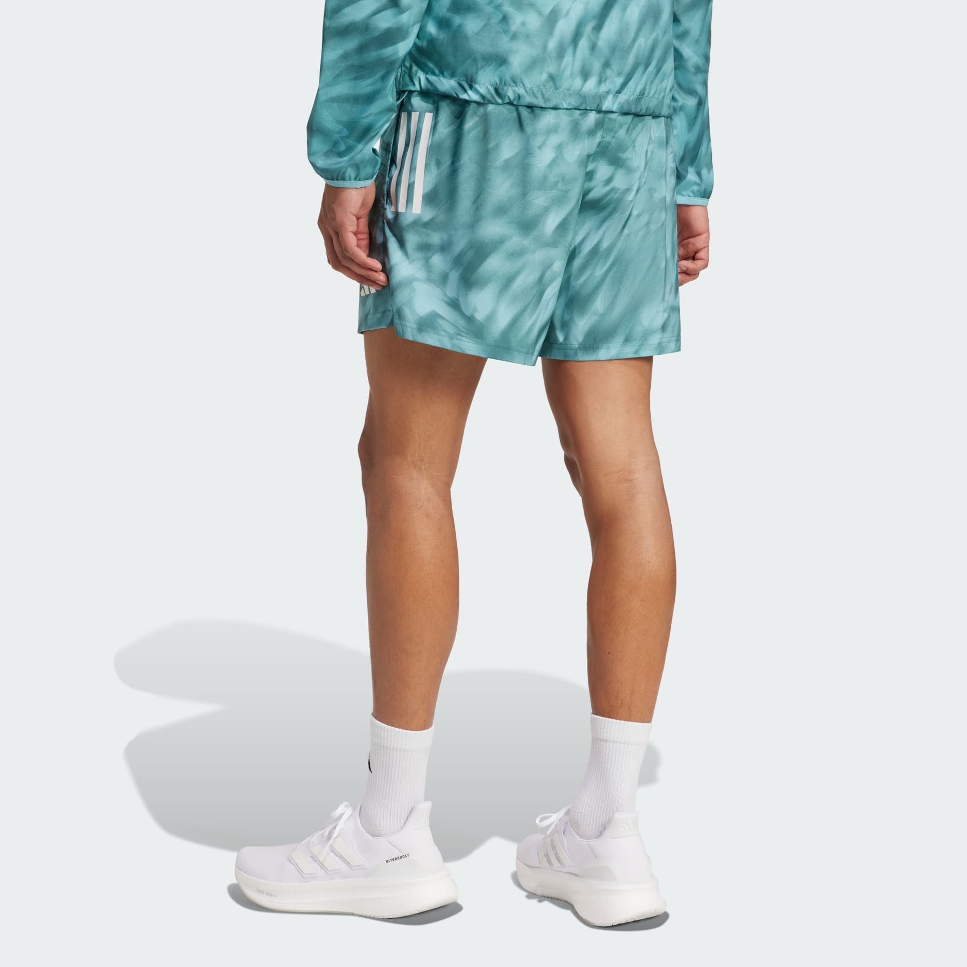 Own The Run Allover Print Shorts