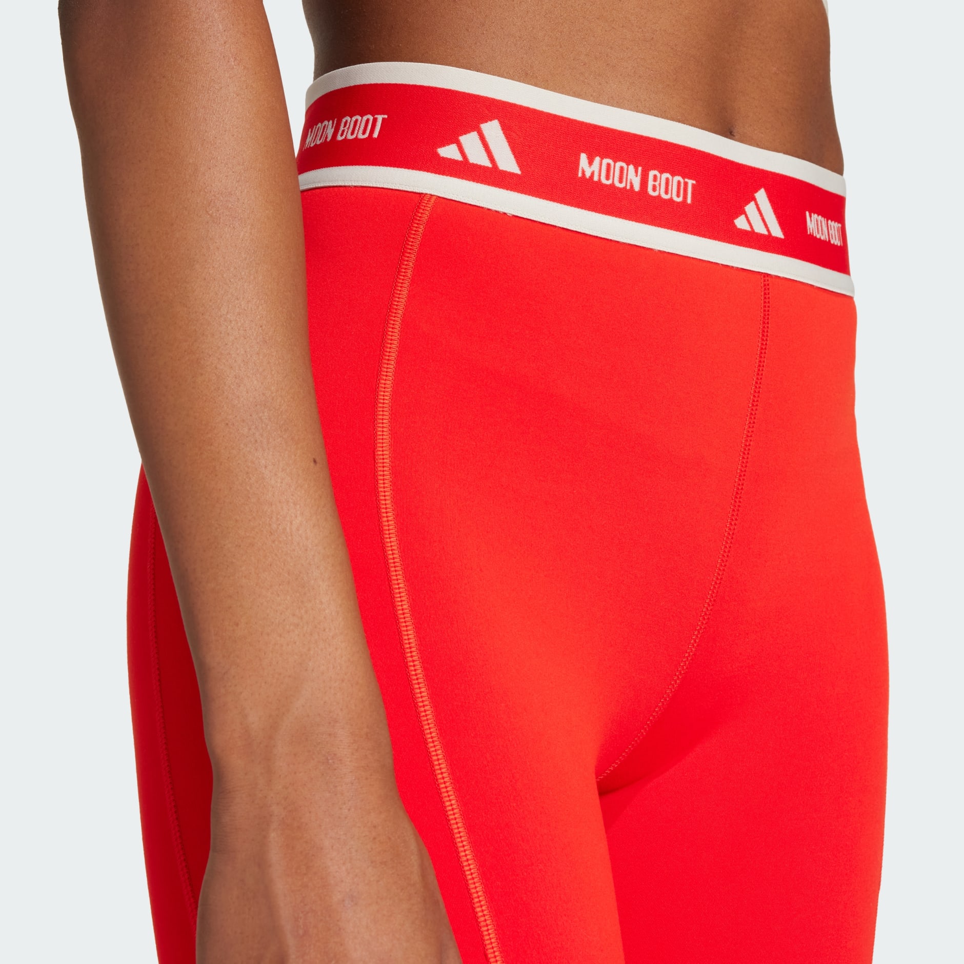 CLOTHING - adidas x MOON BOOT Leggings - Red | adidas Oman