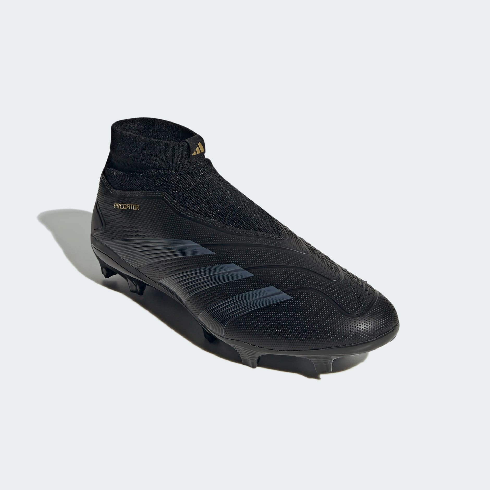 Ghete de fotbal Predator League fără șireturi pentru teren tare.
