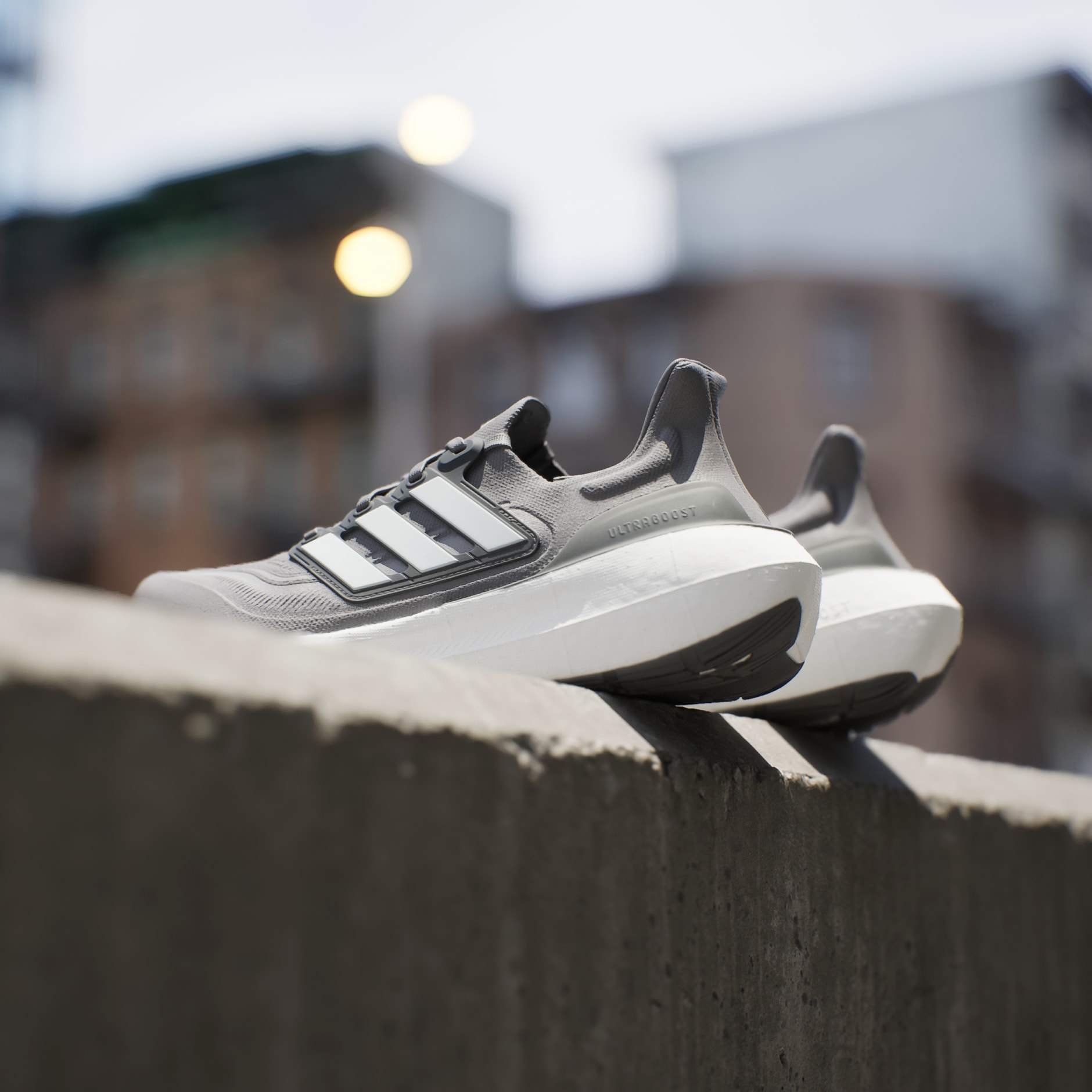 Light grey adidas store shoes