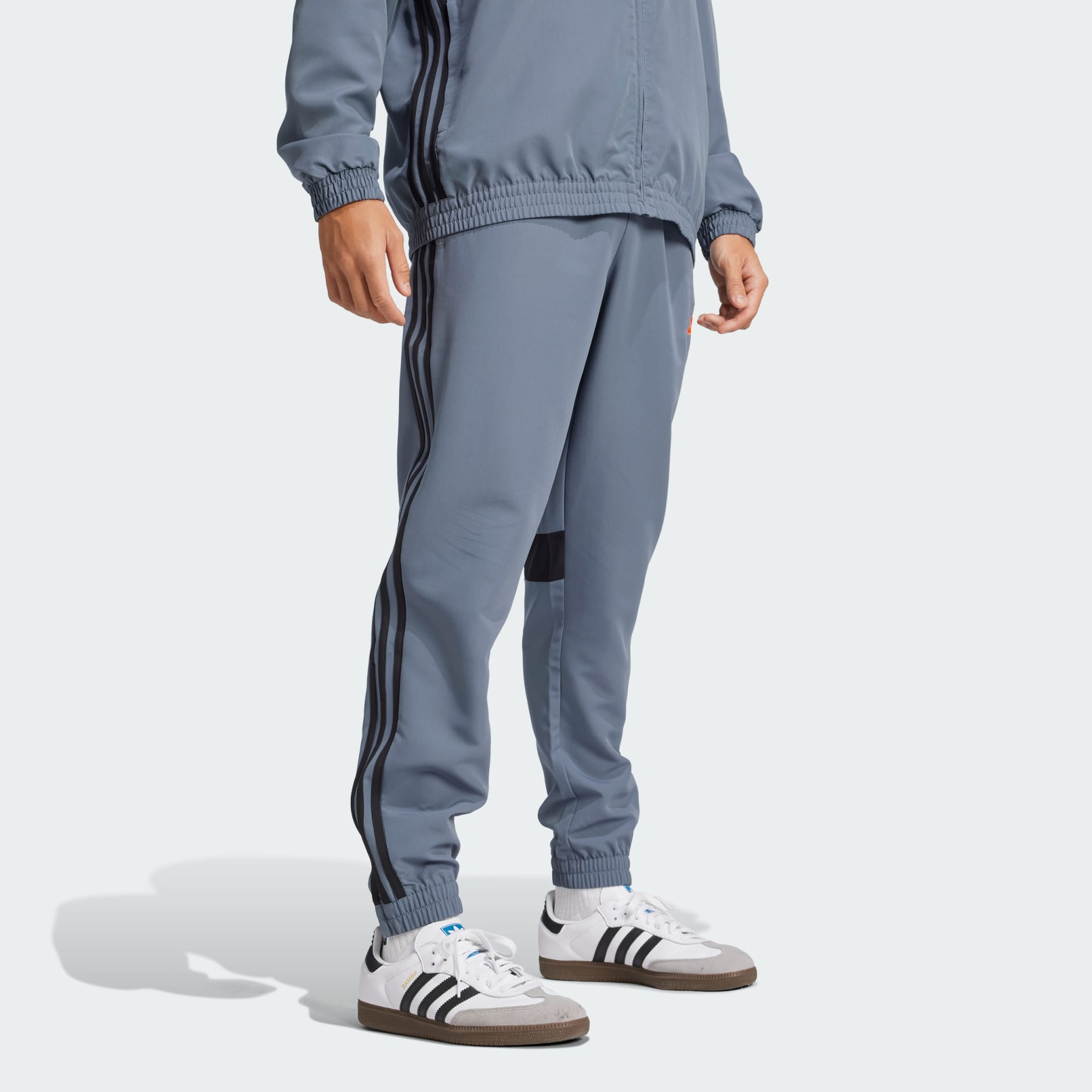 Hlače Tiro 25 Essentials Woven