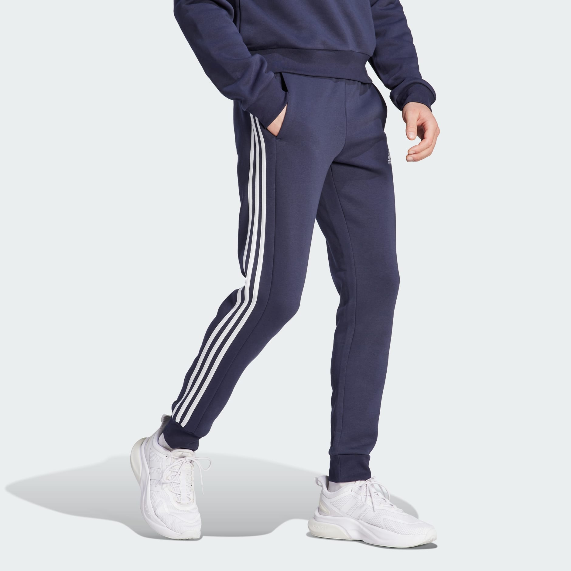 adidas Essentials Fleece 3-Stripes Tapered Cuff Pants - Blue | adidas UAE