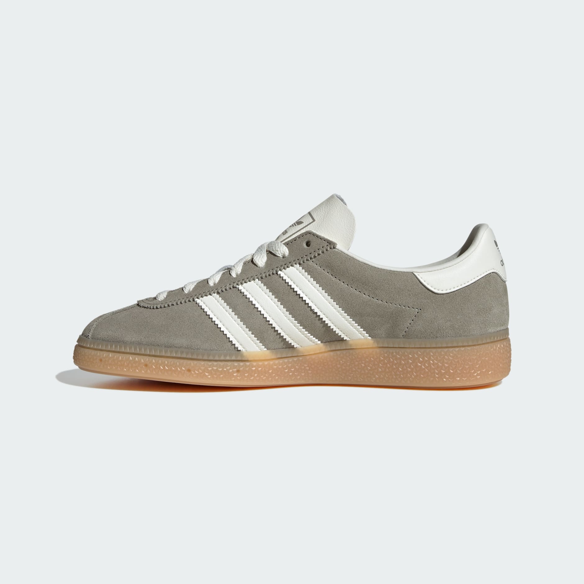 SHOES - Muenchen Shoes - Green | adidas Oman