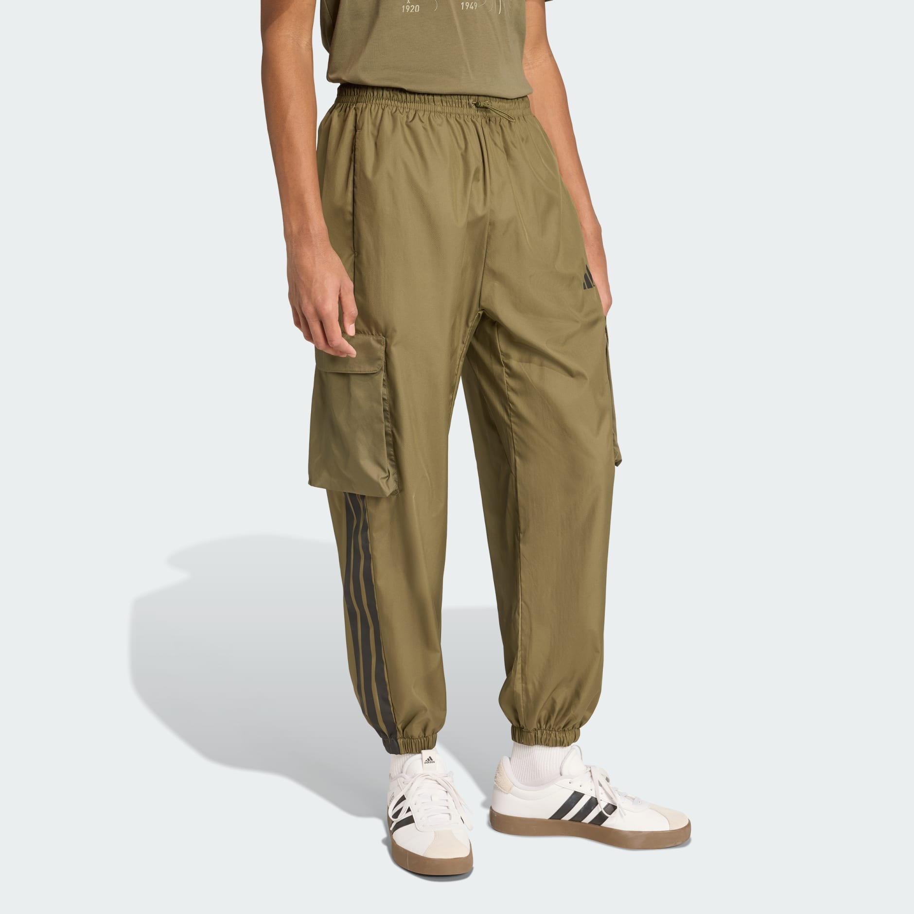 パンツ COMMUNITY UTILITY PANTS / NATURAL Clothing - City Tech Utility Woven Pants - Green | adidas Oman