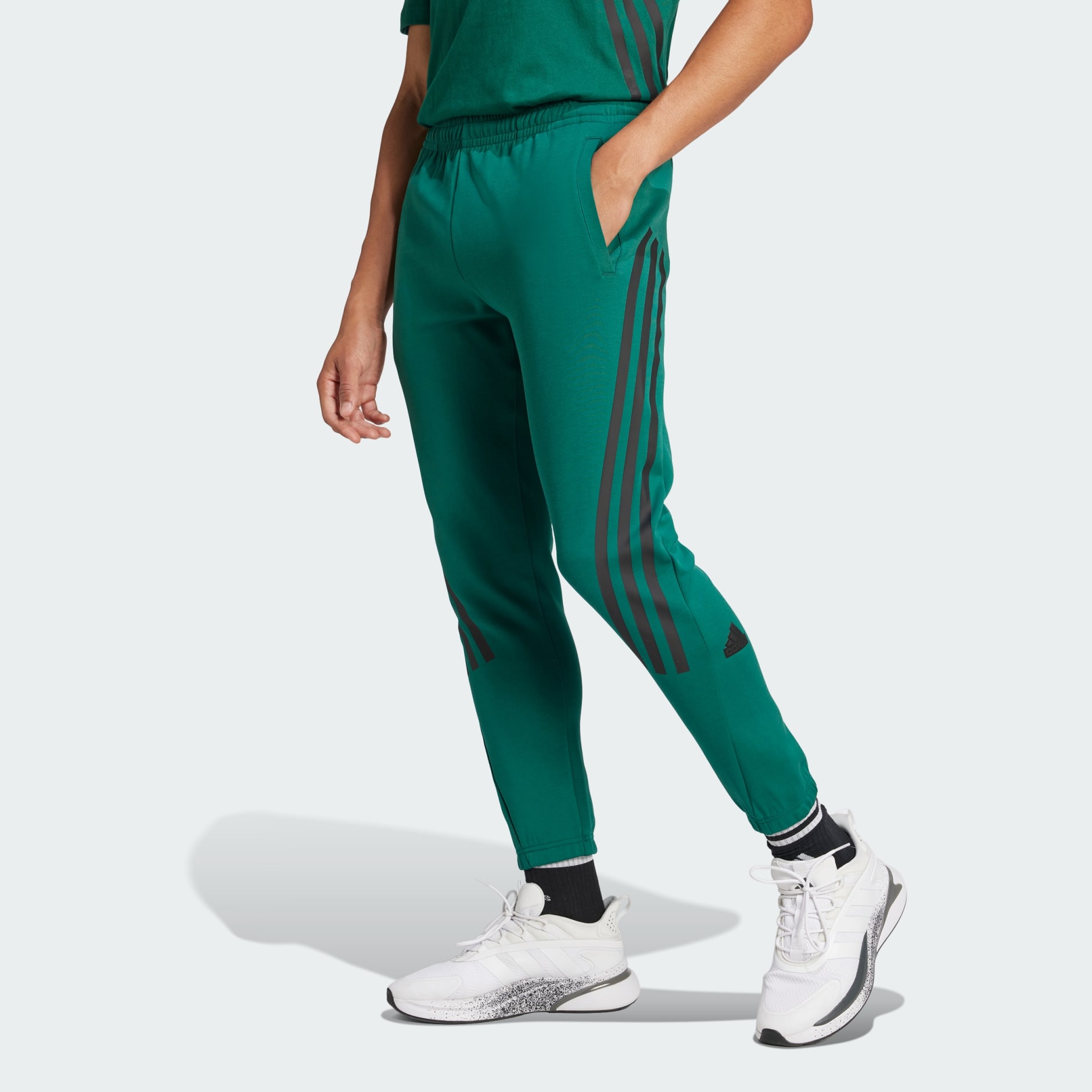 Fashion adidas pants with green stripes