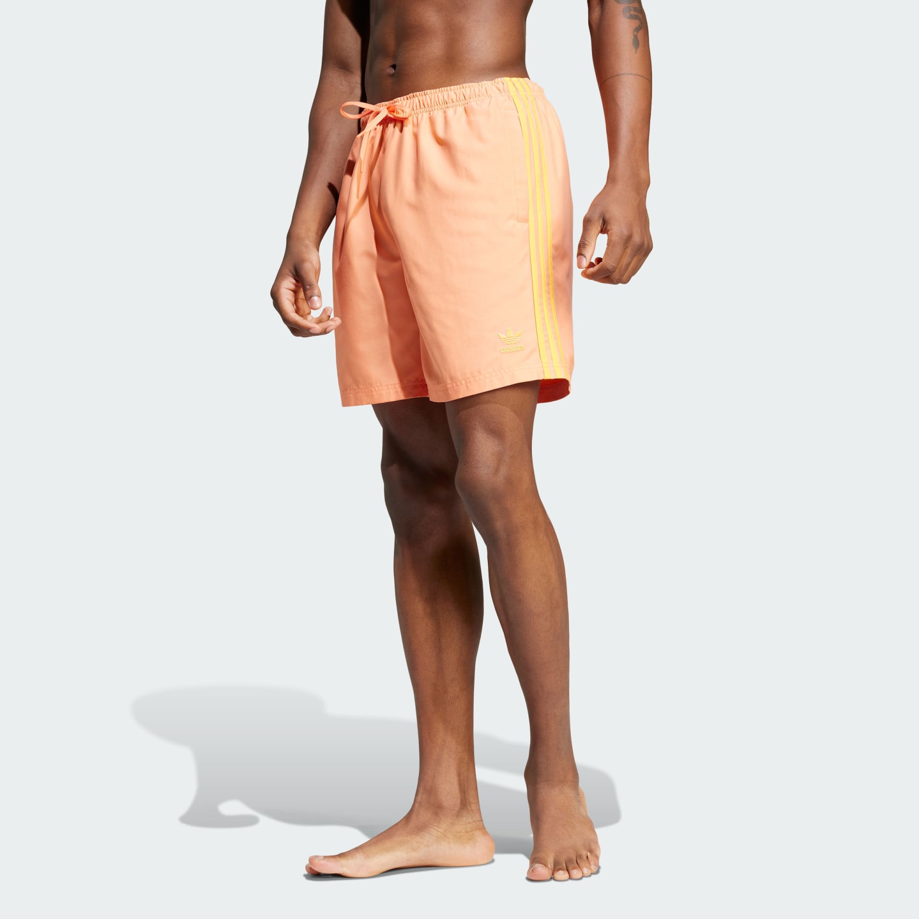 Adidas stripe swim shorts online