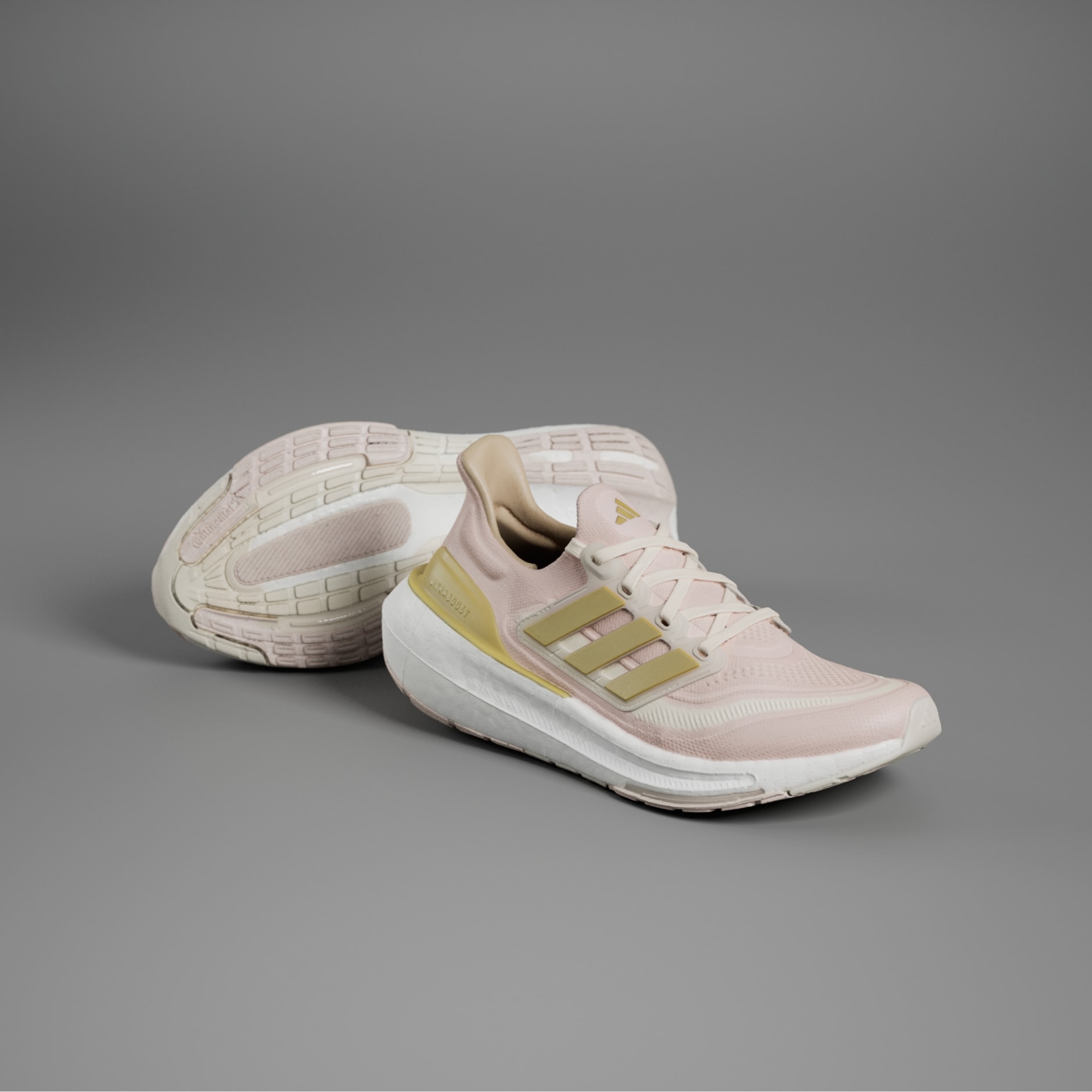 Light pink and store white adidas shoes