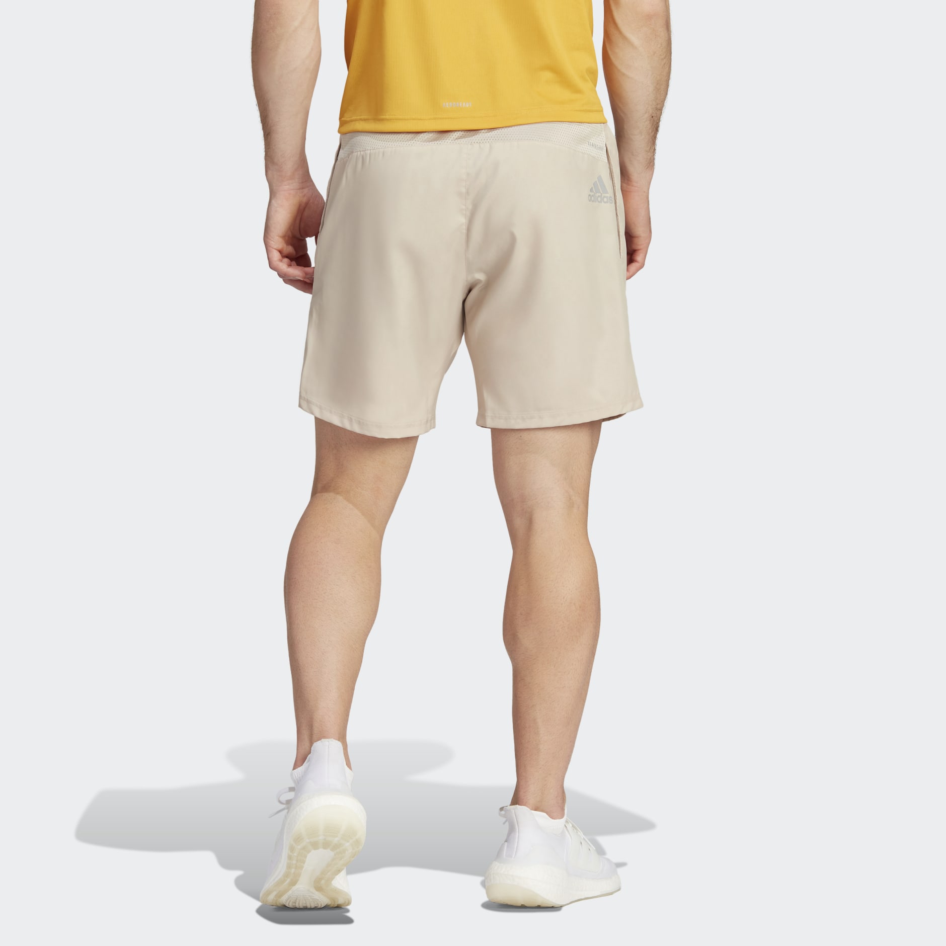 Men's Clothing - Run It Shorts - Beige | adidas Saudi Arabia