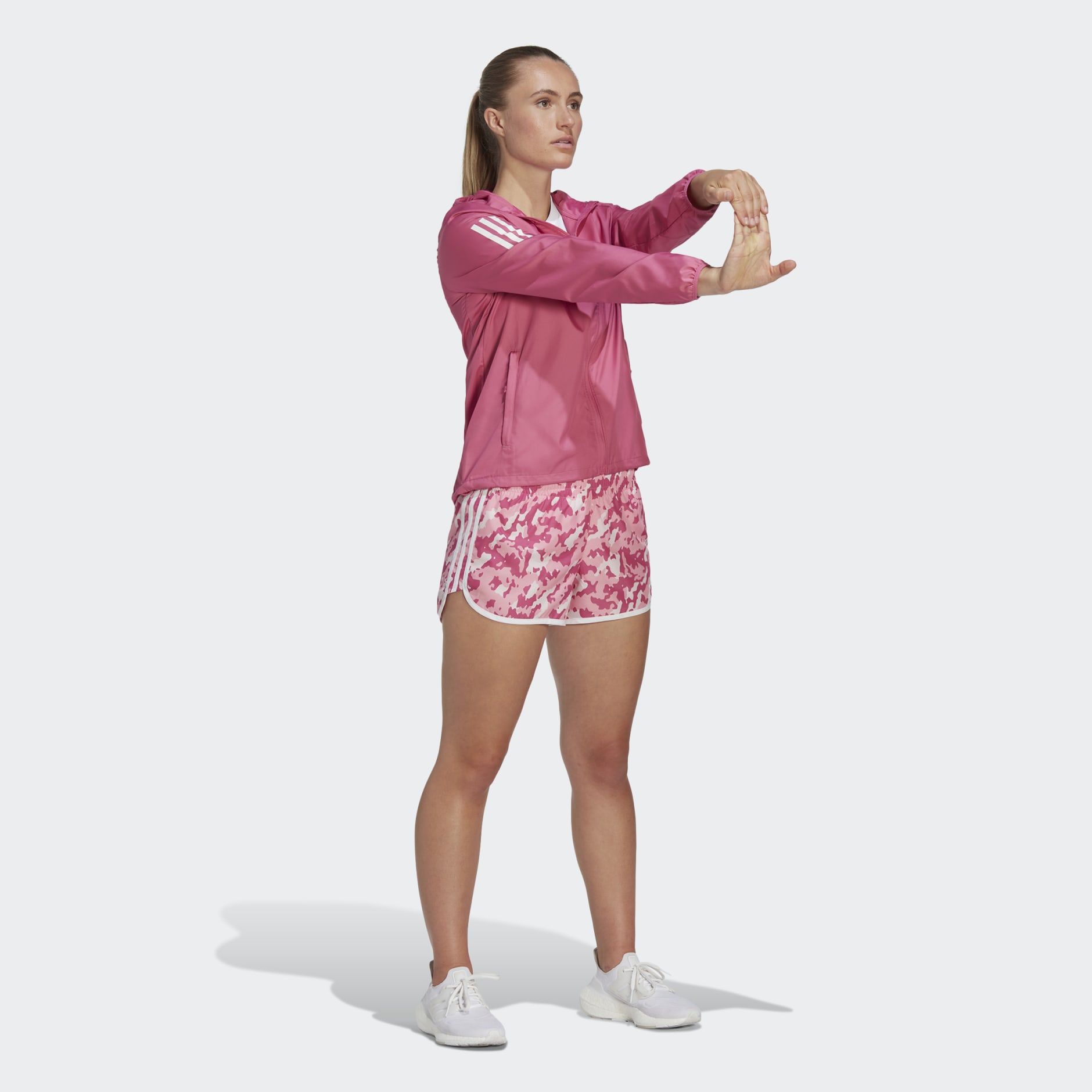 Own the Run Hooded Running Windbreaker