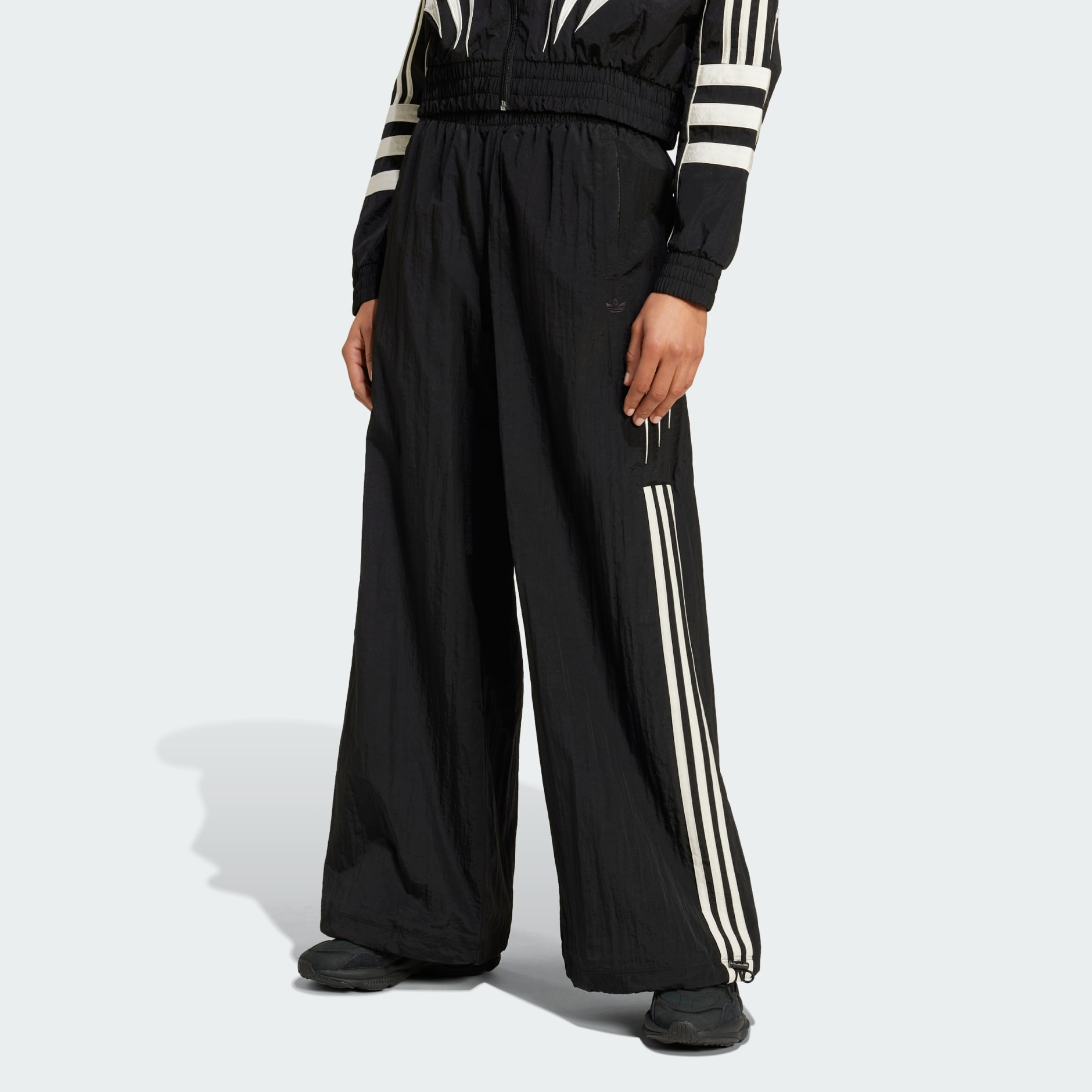 CLOTHING - Atlanta Cut Line Nylon Track Pants - Black | adidas Oman