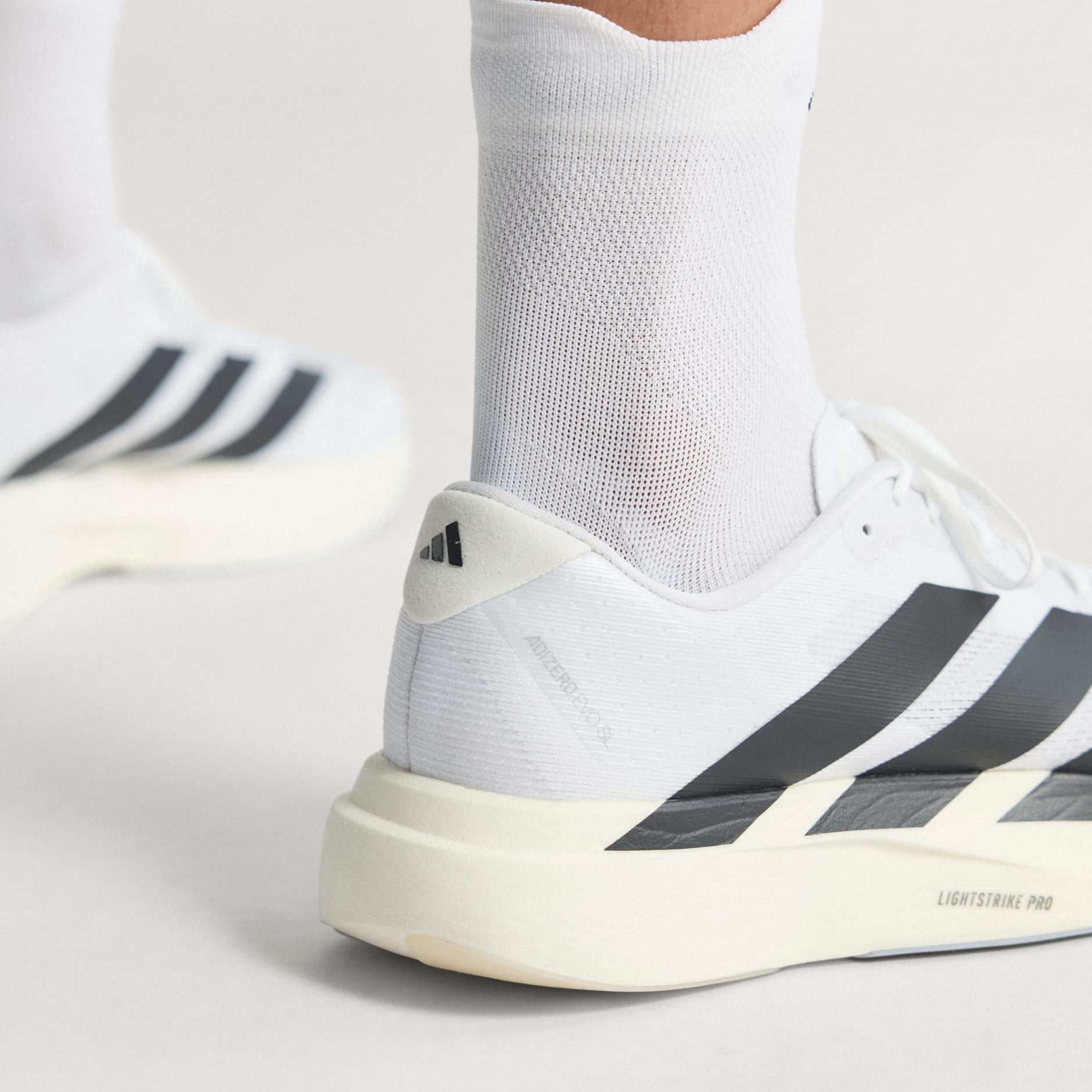 Shoes - Adizero EVO SL Shoes - White | adidas South Africa