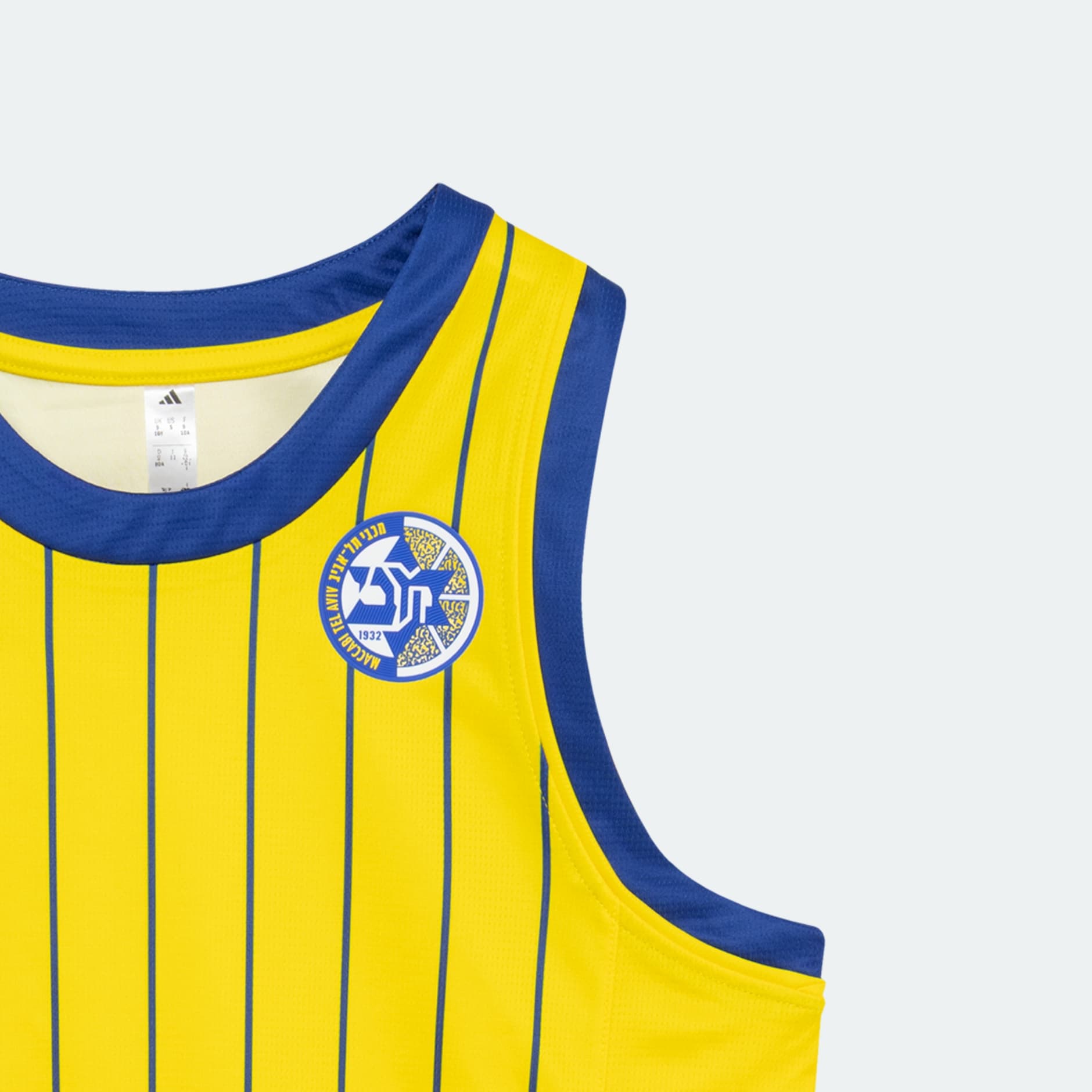 גופיית משחק כדורסל משחקי בית מכבי תל אביב 25/26 ילדים