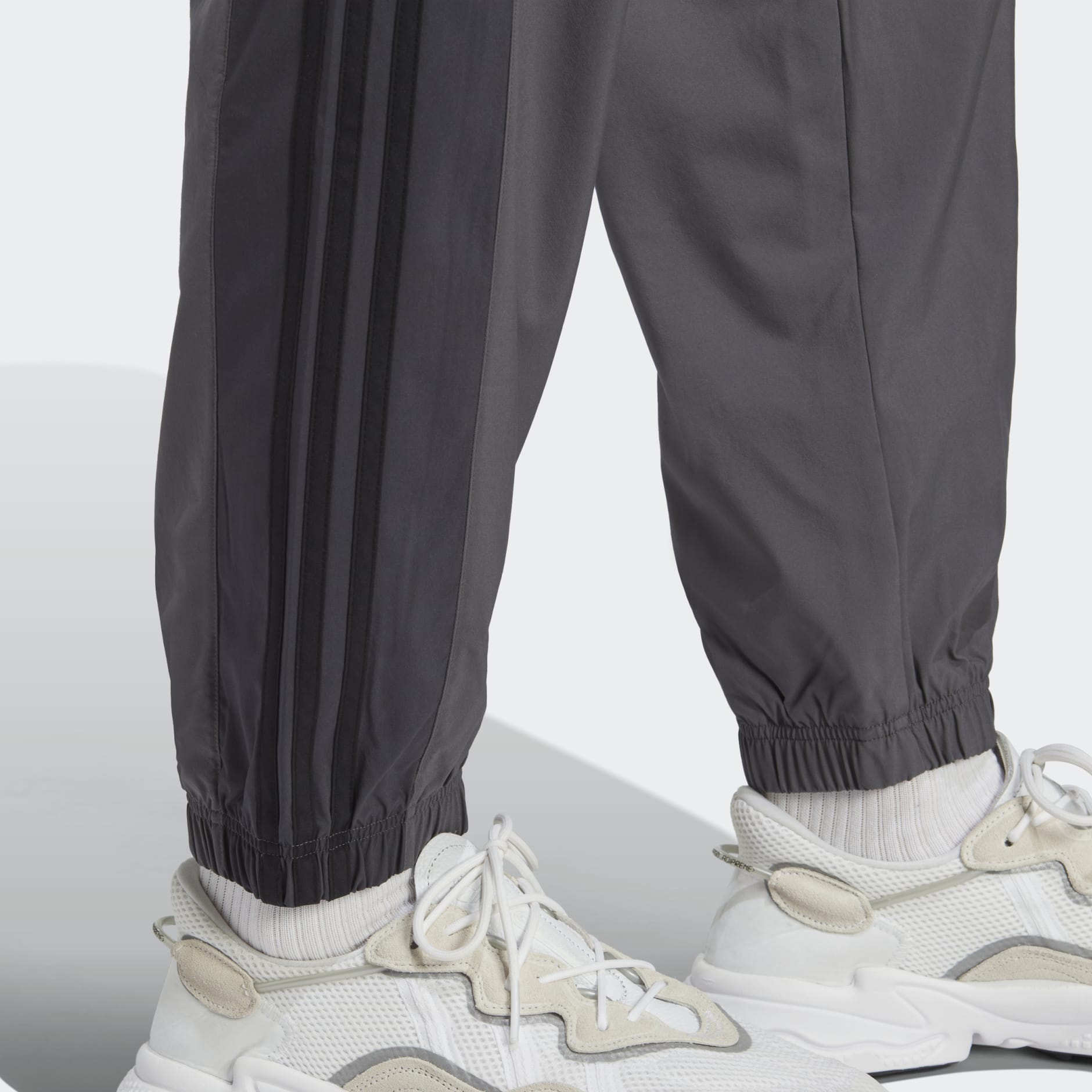 adidas adidas Rekive Woven Track Pants - Grey | adidas OM