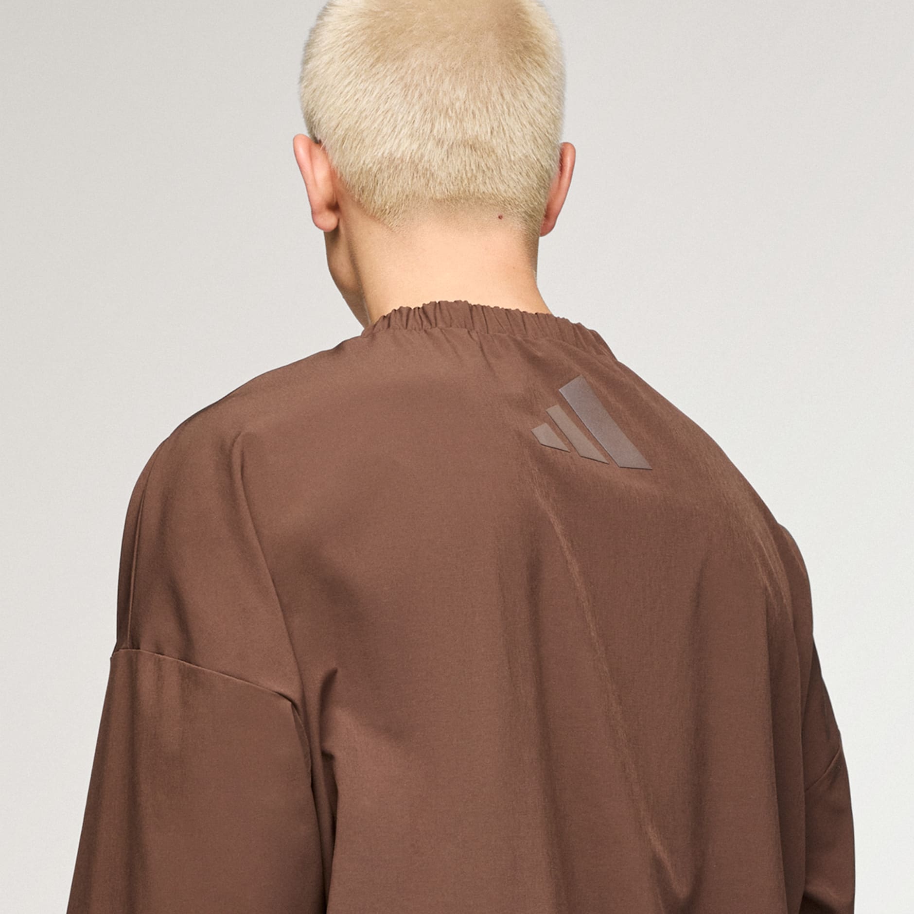 Tkani gornji dio trenirke s patentnim zatvaračem polovicom duljine adidas x entire studios Z.N.E. Uniform