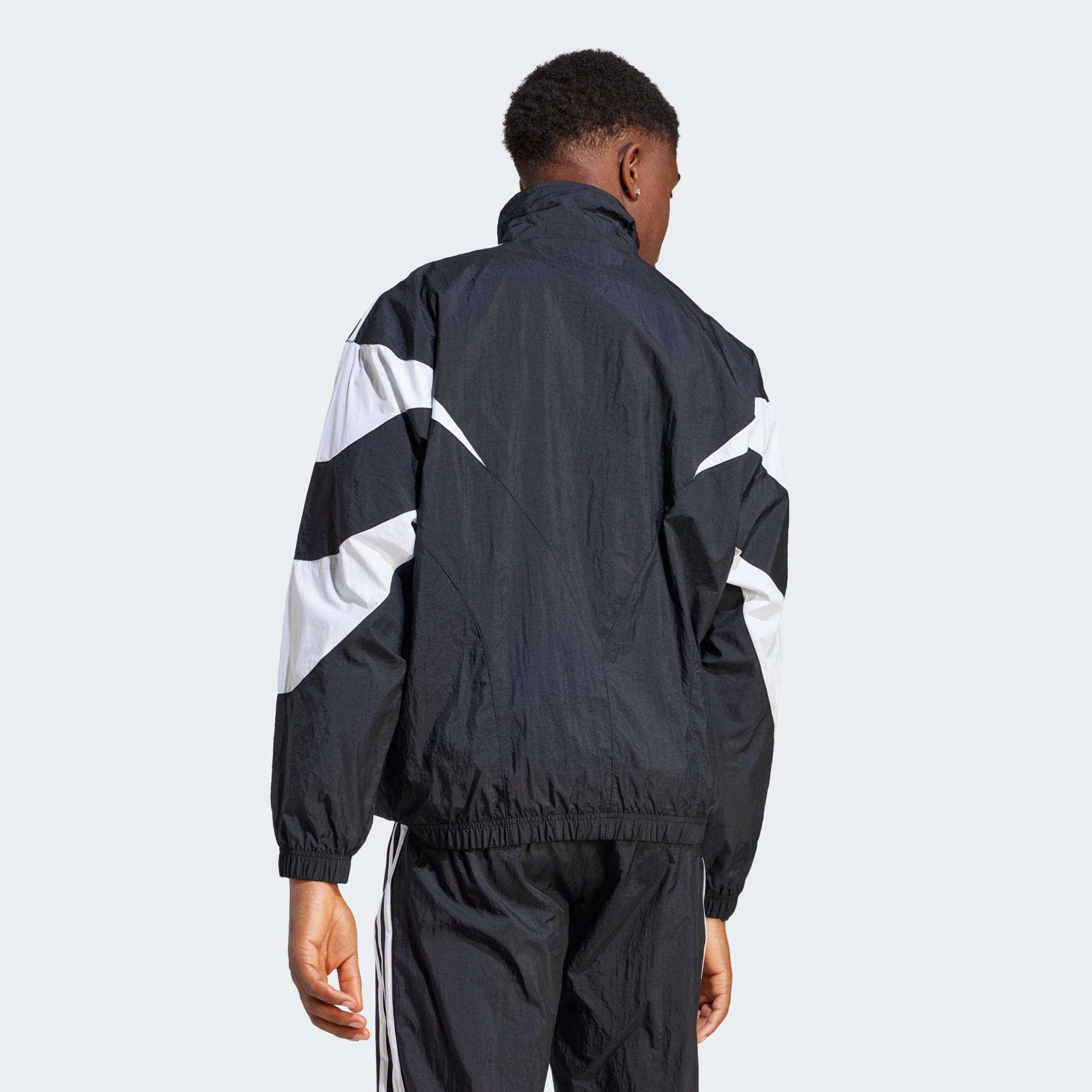 Men\'s Clothing - adidas Rekive Woven Track Jacket - Black | adidas Oman