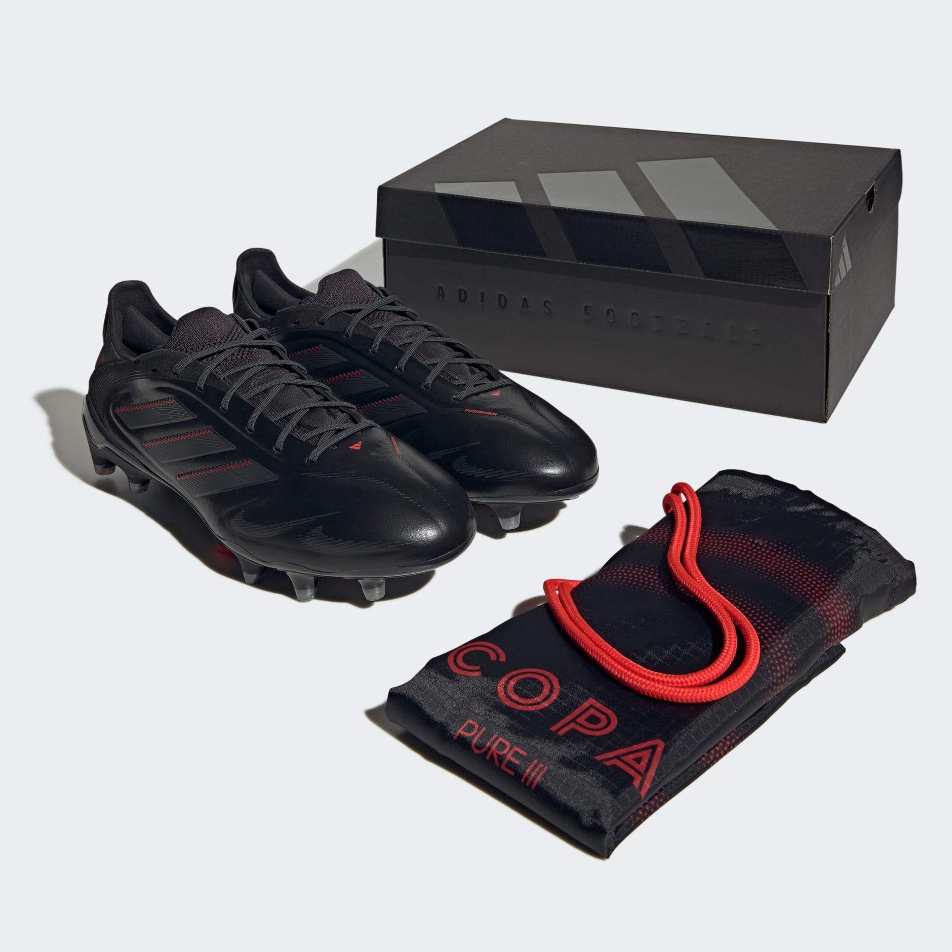 Ghete de fotbal Copa Pure 3 Elite pentru teren ferm