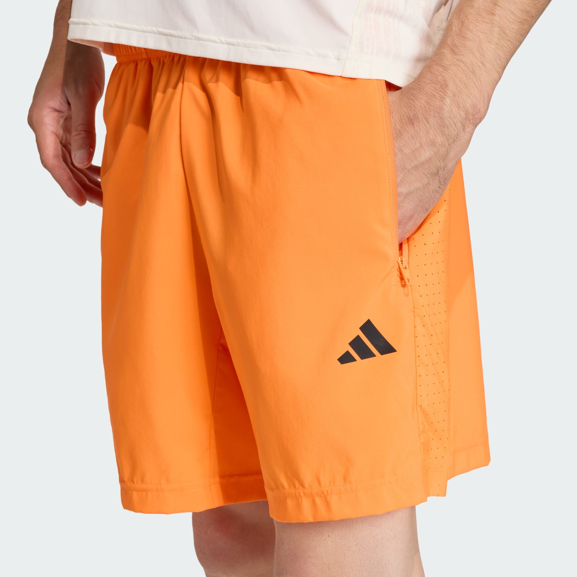 WORKOUT ESSENTIALS BASE WOVEN SHORT