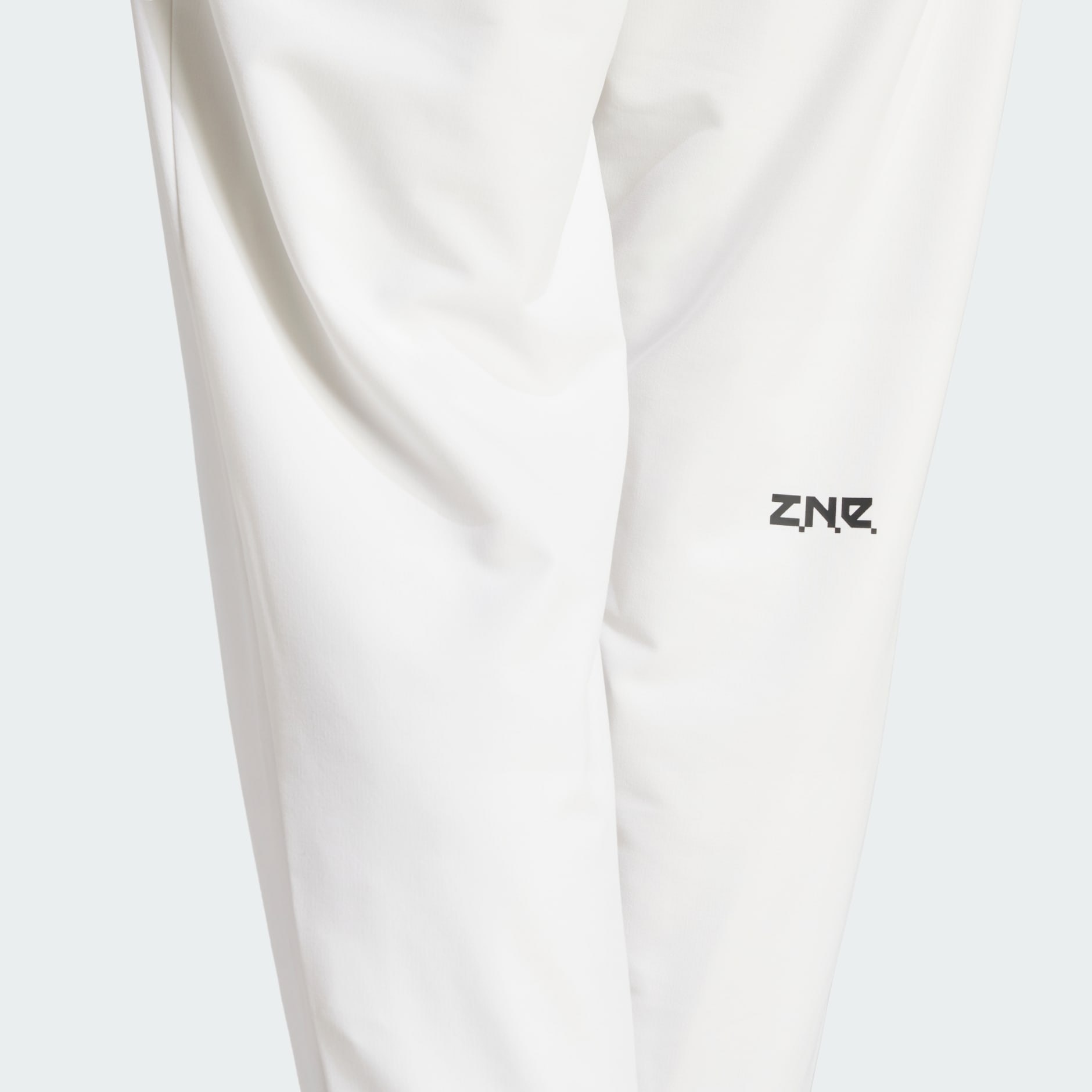 Men's Clothing - Z.N.E. Woven Pants - White | adidas Saudi Arabia