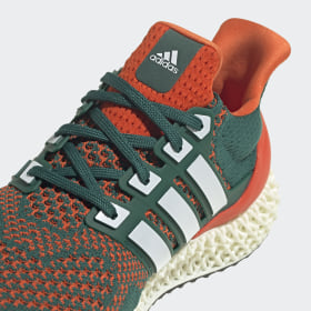 green adidas running trainers