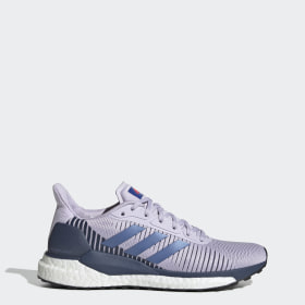 purple running trainers