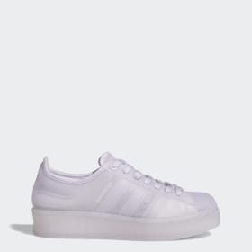 purple and white adidas sneakers