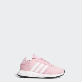 white and pink adidas trainers