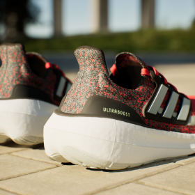 Red and black hot sale adidas sneakers