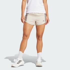 Shorts Own The Run 3 Tiras Beige Mujer Running