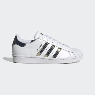 black adidas with silver stripes