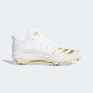 gold and white softball cleats