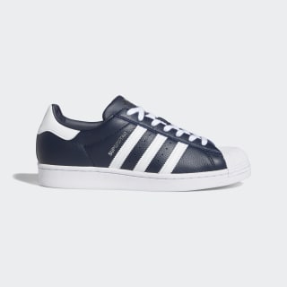 navy blue and white adidas sneakers