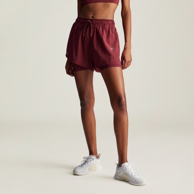 กางเกงเทรนนิงขาสั้นดีไซน์ทูอินวัน adidas by Stella McCartney TruePurpose