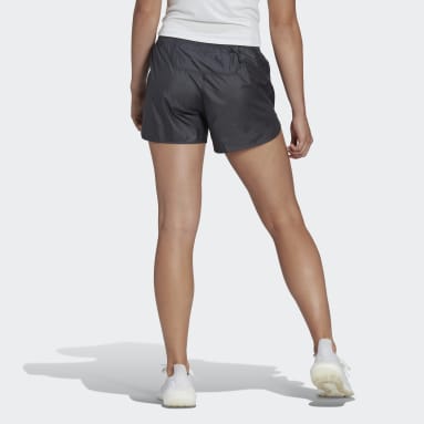 La mujer con pantalones cortos pantalones cortos de gimnasia deportiva -  China Pantalones cortos pantalones cortos y gimnasio precio