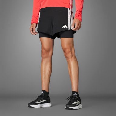 กางเกงวิ่งขาสั้นดีไซน์ทูอินวันแบบมีช่องเก็บเจล Adizero