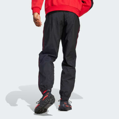 ผู้ชาย Originals สีดำ กางเกงแทรคผ้าทอ adidas Rekive