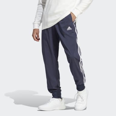 Muži Sportswear modrá Kalhoty AEROREADY Essentials Tapered Cuff Woven 3-Stripes