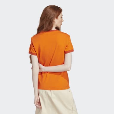 ผู้หญิง Originals สีส้ม เสื้อยืดโลโก้ทรงสลิม adidas Adventure